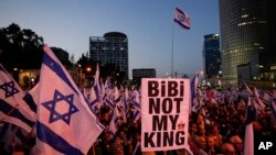 Israelis protest plans by Prime Minister Benjamin Netanyahu's government to overhaul the judicial system, in Tel Aviv, Israel, May 6, 2023. 