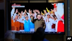 FILE - A TV screen shows a report of North Korea's spy satellite into orbit with its third launch attempt this year with an image of North Korea's leader Kim Jong Un during a news program at the Seoul Railway Station in Seoul, South Korea, Nov. 22, 2023.