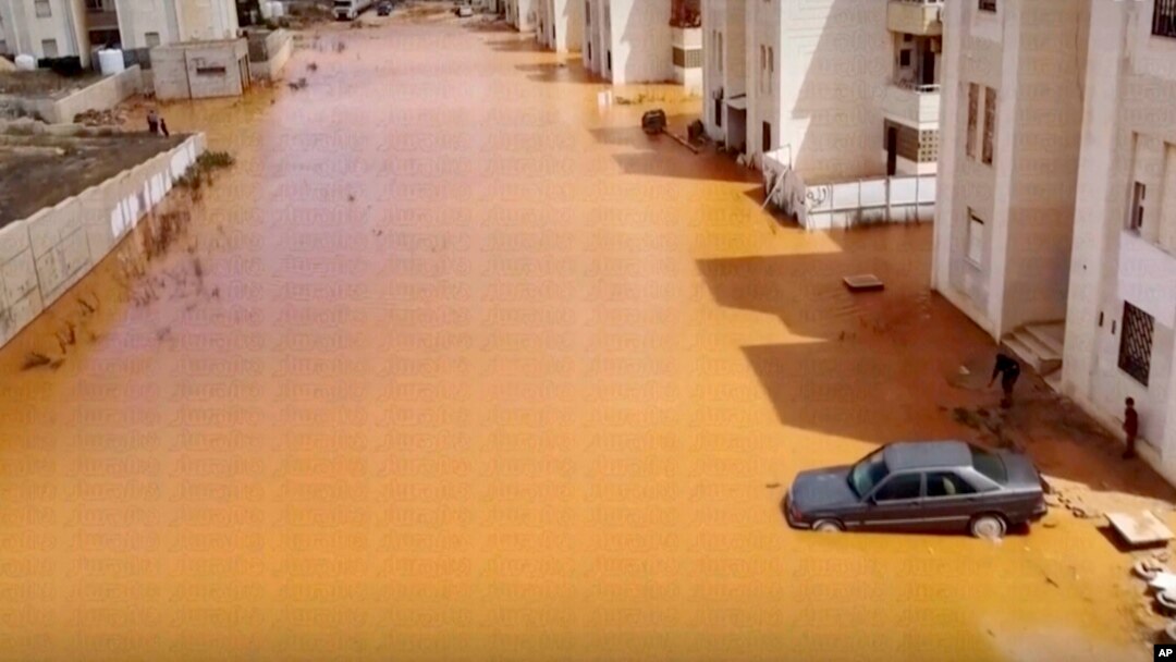 Streets are flooded after being hit by Storm Daniel in Marj, Libya, Sept. 11, 2023. (Libya Almasar TV via AP)