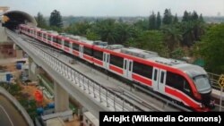 Jabodebek LRT departing test from Harjamukti station train during test run, 6 November 2019. (Wikipedia/Ariojkt)