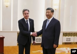 中國領導人習近平在北京人大會堂會晤到訪的美國國務卿布林肯。（2019年6月19日）