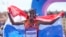 Sifan Hassan, of the Netherlands, celebrates after crossing the finish line to win the gold medal at the end of the women's marathon competition at the 2024 Summer Olympics, Aug. 11, 2024, in Paris. 