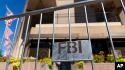 FILE - The FBI building headquarters is seen in Washington, Aug. 13, 2022. 