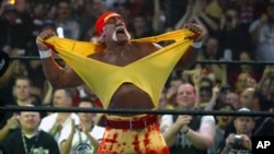 FILE - Hulk Hogan fires up the crowd between matches during WrestleMania 21 in Los Angeles, April 3, 2005. 
