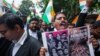 FILE - People protest against recent attacks on Hindus in Bangladesh, in Hyderabad, India, Aug. 14, 2024.