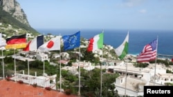 A view of German, French, Japanese, European Union, Italian, Capri and US flags blowing in the wind, ahead of the G7 Foreign Ministers summit, in Capri, Italy, April 17, 2024.