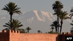FILE: A picture shows a section of the walls around the Agdal gardens and High Atlas mountain range (background) in Marrakesh on December 29, 2014 .
