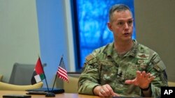 FILE - Lt. Gen. Alexus Grynkewich, the head of U.S. Air Forces Central Command, speaks at a news conference at the U.S. Embassy in Abu Dhabi, United Arab Emirates, Sept. 20, 2023.