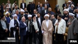 Hamas representative to Lebanon Osama Hamdan is seen wearing a white jacket, 2nd from right, and looking at Iranian President Ebrahim Raisi at the opening ceremony of an 'Islamic Unity Conference' in Tehran, Oct. 1, 2023. (Source: IRNA)