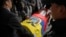 The remains of slain presidential candidate Fernando Villavicencio arrive at Camposanto Monteolivo cemetery for burial in Quito, Ecuador, Aug. 11, 2023. 