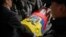 The remains of slain presidential candidate Fernando Villavicencio arrive at Camposanto Monteolivo cemetery for burial in Quito, Ecuador, Aug. 11, 2023. 