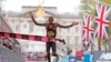 Alexander Mutiso Munyao of Kenya crosses the finish line to win the men's race at the London Marathon in London, April 21, 2024.