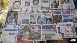 FILE - The front pages of Mexican newspapers show the news of the capture of Ismael 'El Mayo' Zambada, in Mexico City, Mexico on July 26, 2024.