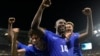 France's Jean-Philippe Mateta (14) celebrates with teammates after scoring his side's second goal in extra time during the men's semifinal soccer match between France and Egypt, at Lyon Stadium, during the 2024 Summer Olympics, Aug. 5, 2024.