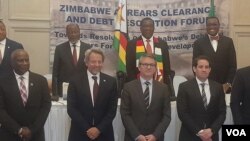 Joachin Chisano, President Emmerson Manngagwa and several others attending a conference focusing on Zimbabwe's debts