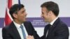 French President Emmanuel Macron, right, and Britain's Prime Minister Rishi Sunak shake hands during a joint news conference at the Elysee Palace in Paris, March 10, 2023.