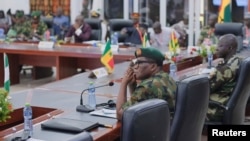 FILE - ECOWAS Committee of Chiefs of Defense staff meet on the deployment of a standby force on counterterrorism, in Accra, Ghana, Aug. 17, 2023.