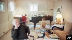 FILE - John Williams sits in his bungalow in the Universal Studio compound of Amblin Entertainment in Universal City, California on April 13, 1999. At the time, he had just completed composing music for Star Wars: The Phantom Menace.