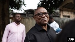 FILE: Labor Party presidential candidate Peter Obi (C) talks to the media at his house in Amatutu on February 25, 2023.