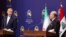 Iranian Foreign Minister Hossein Amir-Abdollahian and Iraqi Foreign Minister Fuad Hussein attend a joint news conference, in Baghdad, Iraq, Feb. 22, 2023. Iran has complained about the presence of Iranian opposition groups at a ceremony in Iraq's autonomous Kurdish region. 