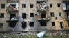 In this photo provided by the Kherson Regional Military Administration, a destroyed apartment building sits at the site of a Russian army attack with guided aerial bombs in Kherson, Ukraine, May 15, 2024. (Kherson Regional Military Administration via AP)