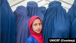 افغان خواتین اور ایک بچی: فائل فوٹو