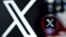 FILE - A photo shows the logo of the online social media and social networking service X — formerly Twitter — on a smartphone screen in Frankfurt am Main, Germany, March 11, 2024.