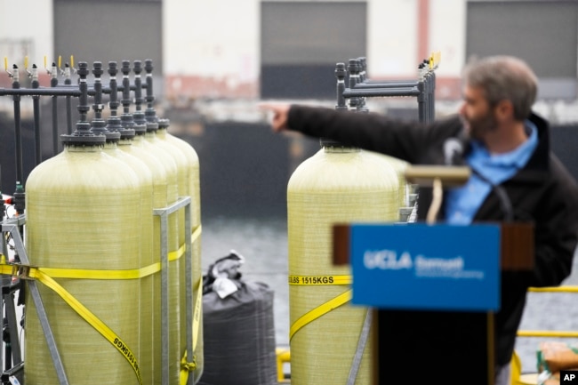 Thomas Traynor of UCLA says the technique can remove carbon dioxide from seawater and produce hydrogen, a green energy fuel, in the process. (AP Photo/Ashley Landis)