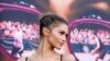 FILE - Zendaya, a cast member in 'Challengers,' poses at the premiere of the film at the Regency Village Theatre, April 16, 2024, in Los Angeles. (AP Photo/Chris Pizzello)