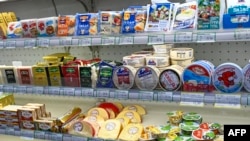 Cheese imported from Europe is displayed at a supermarket in Beijing, Aug. 21, 2024. Beijing has launched a probe into EU subsidies of some dairy products imported into China. 