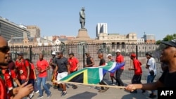 FILE: Members of the the Economic Freedom Fighters (EFF) gather at Church Square in Pretoria on March 20, 2023 during a "national shut-down" called by their party to bring the country to a halt.