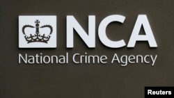 A sign is seen outside the National Crime Agency (NCA) headquarters in London, Oct. 7, 2013.