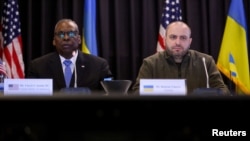 US Secretary of Defense Lloyd Austin and Ukrainian Defense Minister Rustem Umerov attend a meeting of the Ukraine Defense Contact Group at the American military's Ramstein Air Base, Germany, March 19, 2024. 