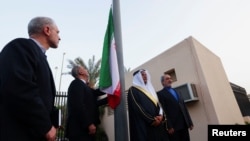 FILE - Diplomatic officials from Iran and Saudi Arabia attend a ceremony for the reopening of the Iranian Embassy in Riyadh, Saudi Arabia, June 6, 2023.