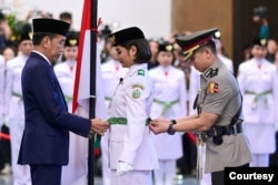 Upacara pengukuhan anggota Paskibraka oleh Presiden Joko Widodo di Istana Negara, Ibu Kota Nusantara, Kalimantan Timur, Selasa (13/8). (Courtesy: Setpres RI)