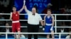 Taiwan's Lin Yu-ting, left, celebrates after defeating Turkey's Esra Yildiz in their women's 57 kg semifinal boxing match at the 2024 Summer Olympics, Aug. 7, 2024, in Paris.