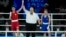 Taiwan's Lin Yu-ting, left, celebrates after defeating Turkey's Esra Yildiz in their women's 57 kg semifinal boxing match at the 2024 Summer Olympics, Aug. 7, 2024, in Paris.