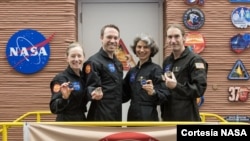 This image shows the CHAPEA leaving the Mars habitat mission July 6, 2024, at NASA’s Johnson Space Center in Houston. From left: Kelly Haston, Nathan Jones, Anca Selariu, and Ross Brockwell. (NASA/Josh Valcarcel)