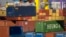 FILE - A crane lifts a shipping container at an automated port in Tianjin, China, Jan. 16, 2023.