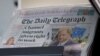 Surat kabar The Daily Telegraph terpampang di sebuah rak koran di sebuah supermarklet di London, pada 20 Januari 2024. (Foto: Reuters/Belinda Jiao)