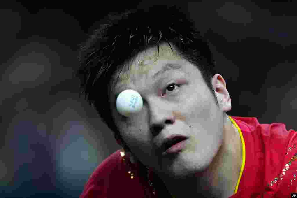 China's Fan Zhendong plays against France's Felix Lebrun during a men's singles semifinal table tennis match at the 2024 Summer Olympics, in Paris, France.