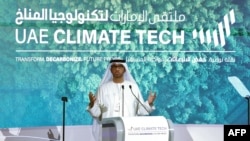 FILE - Sultan al-Jaber, president of this year's COP28 summit, talks during the UAE Climate Tech conference in Abu Dhabi Energy Centre, May 10, 2023.