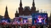 People attend a concert dedicated to the first anniversary of the annexation of four regions of Ukraine that Russian troops control — Lugansk, Donetsk, Kherson and Zaporizhzhia — at Red Square in Moscow, Sept. 29, 2023. 