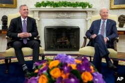 President Joe Biden meets with House Speaker Kevin McCarthy to discuss the debt limit in the Oval Office of the White House, May 22, 2023. (AP Photo/Alex Brandon)