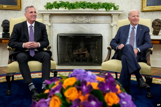 President Joe Biden meets with House Speaker Kevin McCarthy to discuss the debt limit in the Oval Office of the White House, May 22, 2023. (AP Photo/Alex Brandon)