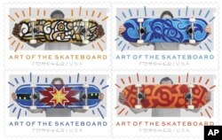 This image provided by the U.S. Postal Service shows its new the "Art of the Skateboard" Forever stamps. The stamps feature designs from four artists from around the country, including two Indigenous artists.