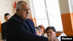 Boyko Borissov, former Bulgarian prime minister and leader of center-right GERB party, casts his vote during the parliamentary election, in Sofia, Bulgaria, April 2, 2023. 