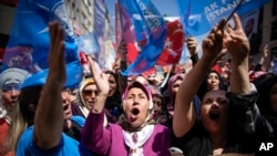 Supporters of Turkish President and People's Alliance's presidential candidate Recep Tayyip Erdogan shout slogans as they attend an election campaign rally in Istanbul, Turkey, May 13, 2023. 