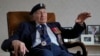 FILE - Mervyn Kersh, a D-Day veteran who fought in the Normandy campaign, at his home in London, April 8, 2024.