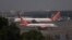 FILE - Air India passenger jets are seen on the tarmac at Chhatrapati Shivaji International airport in Mumbai, India, Feb. 14, 2023.